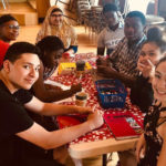 Book 1 with graduates of the Junior Youth Spiritual Empowerment Program from Mcquesten and other youth