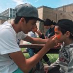 Peanut Childrens Festival JY paints on childs face 1