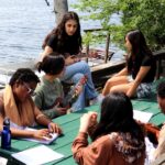 The text focuses on the fundamental principles of the Bahá’í Faith, which are like rays of light that illuminate reality. Photo: Yasha Shodjaee-Zrudlo